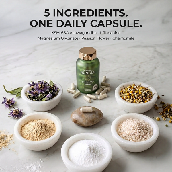 Eunoia supplement bottle with ingredients on a marble surface